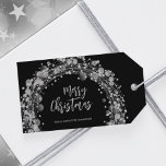 Silver Stars Merry Christmas Black Gift Tags<br><div class="desc">Merry Christmas in chic lettering is surrounded by twinkling stars,  circles and dots on black holiday party favour gift tags. Personalise with your names at the bottom. MATCHING items in our store.</div>