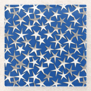 Silver stars on cobalt blue glass coaster