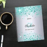 Silver teal glitter name monogram 2025 planner<br><div class="desc">A faux silver looking background decorated with teal,  sea green faux glitter dust. Personalise and add your first name,  monogram initials,  full name and a year.</div>