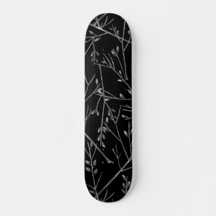 Silver Twigs on Black Skateboard