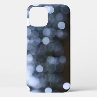 Silver, white bokeh night background. iPhone 12 case