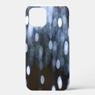 Silver, white bokeh night background. iPhone 12 case
