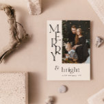 Simple Beige Merry Typography Wildflower Christmas Holiday Card<br><div class="desc">Spread some holiday cheer with our Simple Beige Merry Typography Wildflower Photo Christmas Card! Perfect for young families who love nature, this modern and minimal holiday card is full of festive vibes. Capture your beautiful Christmas photo in the retro-inspired combination of warm earthy tones and classic black serif typography with...</div>