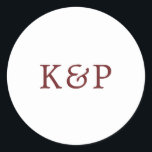 Simple Burgundy and White Monogram Wedding Classic Round Sticker<br><div class="desc">Simple wedding stickers with your two initial monogram in a burgundy serif font over a white background. The background and font colours may be changed to any colours that you wish. A basic and plain design that still comes across as stylish. These modern and minimalist stickers are perfect for sealing...</div>