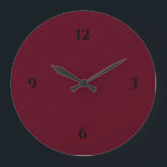 Simple Burgundy Wine & Black Large Clock<br><div class="desc">Modern clock features a minimalist design in a burgundy colour palette with black accents. A simple plain design with black numbers on a burgundy wine coloured background. A trendy addition to your kitchen, living room or office wall, a thoughtful modern office gift or modern home gift for any occasion. You...</div>