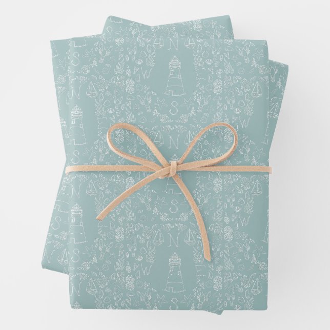 Simple Coastal Seaside Lighthouse Compass Nautical Wrapping Paper Sheet (In situ)