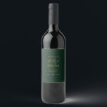 Simple Elegant Christmas Green Wedding Wine Label<br><div class="desc">This simple elegant Christmas | green wedding wine label is perfect for your minimalist modern winter wedding. The classic gold luxury calligraphy, along with the traditional green background, all bordered with a minimal frame, is sure to complete the colourful holiday vibe you're looking for. You can personalise with your own...</div>