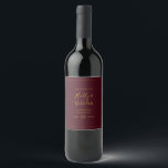 Simple Elegant Christmas Red Wedding Wine Label<br><div class="desc">This simple elegant Christmas red wedding wine label is perfect for your minimalist modern winter wedding. The classic gold luxury calligraphy, along with the traditional red background, all bordered with a minimal frame, is sure to complete the colourful holiday vibe you're looking for. You can personalise with your own photos...</div>