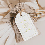Simple Elegant Christmas | White Wedding Welcome Gift Tags<br><div class="desc">These simple elegant Christmas | white wedding welcome gift tags are perfect for your minimalist modern winter wedding. The classic gold luxury calligraphy, along with the traditional white background, all bordered with a minimal frame, is sure to complete the colourful holiday vibe you're looking for. You can personalise with your...</div>