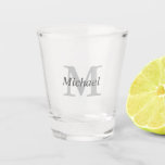 Simple Elegant Monogram and Name Shot Glass<br><div class="desc">This design has a large monogram initial in light grey with the name in darker charcoal grey placed across the initial. Personalise this design for someone special by replacing the sample text shown in the design template. This item makes a nice groomsman gift, Father's Day or birthday gift, housewarming gift...</div>