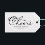 Simple Elegant Script Cheers Wine Bottle Tags<br><div class="desc">Transform your wedding day into a celebration of sophistication and elegance with our stunning black and white modern wedding suite! You can personalise it with just a few clicks to express your unique love story. This inspiring collection includes everything you need to create a beautifully cohesive atmosphere, featuring matching menu...</div>