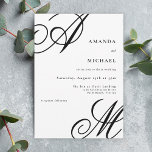 Simple Elegant Script Monogram Wedding Invitation<br><div class="desc">Traditional goes modern with this simple minimal wedding invitation in black and white. It features beautiful calligraphy script monograms of the bride and groom on alternate corners. A neat text layout displays the details of your wedding with a clean classic look with black initials and black text over a white...</div>