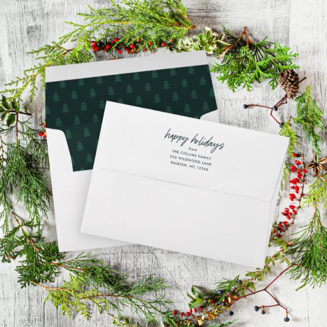 Simple Green Happy Holidays Card  Envelope (Simple handwritten happy holiday envelope with christmas tree pattern interior.)