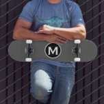Simple Grey Monogram Skateboard<br><div class="desc">A minimalist monogram design with black and white monogram emblem with classic block typography initial on a simple grey background.</div>