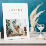 Simple Modern Christmas Photo | Joyful Holiday Plaque<br><div class="desc">Celebrate the warmth of the season with this Joyful Personalised Photo Plaque, designed in a clean, modern style that highlights your favourite family photo. The minimalist layout features colourful “JOYFUL” typography, elegant lines, and customisable text — perfect for displaying on a mantel, shelf, or entryway during the holidays. This piece...</div>