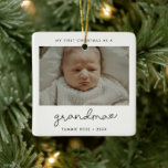 Simple Modern First Christmas as a Grandma Ceramic Ornament<br><div class="desc">A minimalist typography and a modern design for this photo ornament gift. To customise with your favourite baby picture. You can also easily change the colour of the font to your liking. Perfect to celebrate your First Christmas as new Grandma.</div>