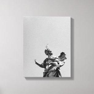 Simple, modern photo of seagull on top of statue canvas print
