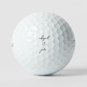 Simple Modern Script Couple Black Names Golf Balls