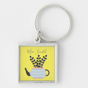 Simple modern teapot with plant pastel key ring