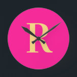 Simple Monogram Modern Hot Pink Round Clock<br><div class="desc">This is a simple, modern, personalised monogram design. This stylish design is in trending hot pink with stylish typography. It's perfect for a personalised gift or ideal as a new home decor accessory for yourself. Simply add your initial letter by typing it into the personalise this text box. Check out...</div>