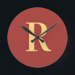 Simple Monogram Modern Round Clock<br><div class="desc">This is a simple, modern, personalised monogram design. This stylish design is in trending brown with stylish typography. It's perfect for a personalised gift or ideal as a new home decor accessory for yourself. Simply add your initial letter by typing it into the personalise this text box. Check out the...</div>