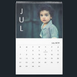 Simple Month minimalist Photo Calendar<br><div class="desc">Customise with 14 or more of your own photos including front and back covers. Month abbreviations on the left are editable as well as the style of the actual calendar layout.</div>