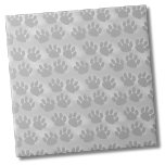 Simple Paw Print Pattern Tile<br><div class="desc">Cute White Grey Animal Paw Prints Pattern.  This cute little animal print is great for pet lovers everywhere or even for a veterinarian office,  dog groomer,  or a dog wash.  Features a light grey background and darker grey paw prints in a scattered pattern.</div>