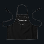Simple Personalised Name Year Little Chef Apron<br><div class="desc">Personalise this black apron with the name of the "little Chef". Modern typography,  white font with customisable text for the Established year and name. Encourage culinary skills at a young age. This thoughtful gift will be remembered by the food expert of the family as they grow.</div>