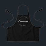 Simple Personalised Name Year Little Chef Apron<br><div class="desc">Personalise this black apron with the name of the "little Chef". Modern typography,  white font with customisable text for the Established year and name. Encourage culinary skills at a young age. This thoughtful gift will be remembered by the food expert of the family as they grow.</div>