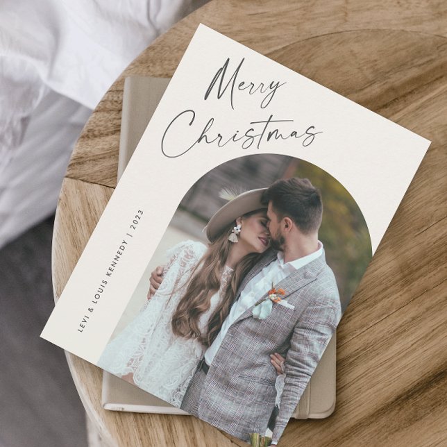 Simple Script Boho Arch Christmas Holiday Card (Simple script boho arch photo Christmas holiday card with modern elegant handwritten typography.)