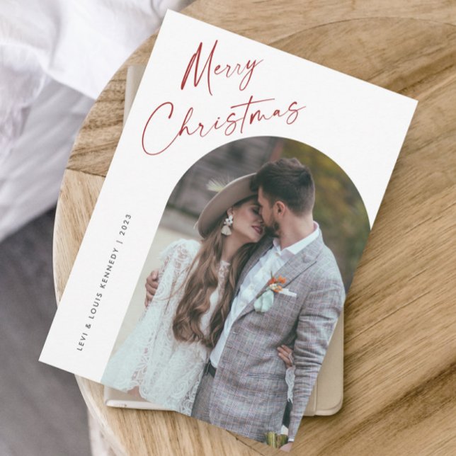 Simple Script Boho Arch Christmas Holiday Card (Simple script boho arch photo Christmas holiday card with modern elegant handwritten typography.)