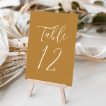 Simple Script Ochre Wedding Table Number<br><div class="desc">Elegant wedding table numbers featuring the table number displayed in a simple white script with an ochre background. The text and background colors can be changed to your wedding colors using the editing tools. To order these table cards, individually edit the card with the number and add it to your...</div>