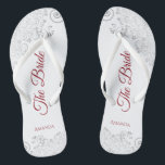 Simple Silver Lace & Red Script The Bride Wedding Flip Flops<br><div class="desc">Dance the night away with these beautiful wedding flip flops. Designed for the bride, they feature a simple yet elegant design with crimson red script lettering on a white background and fancy silver grey lace curls and swirls. Beautiful way to stay fancy and appropriate while giving your feet a break...</div>