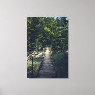 Simple suspension bridge over river Idrijca, Slove Canvas Print