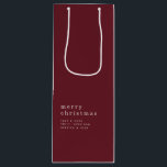 Simple Text Merry Christmas Name Burgundy Wine Gift Bag<br><div class="desc">Simple Text Merry Christmas Name White on Burgundy. Classy simple elegance,  where less is more. The words are stylishly small and understated but the message still loud and clear with your Christmas greeting and names. Fully customisable.</div>