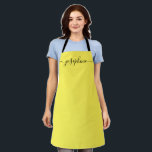 Simple Yellow black Chic Elegant Name Script Apron<br><div class="desc">Simple Yellow Black Chic Elegant Name Script Apron Brighten Her Culinary Journey: This vibrant yellow apron adorned with a beautifully contrasting black script isn’t just a garment; it’s a cheerful companion to her baking, cooking, or gardening endeavours. The personalised name, scripted in elegant long-tail embellishments, brings a chic and elegant...</div>