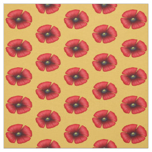 Single red poppy on yellow fabric