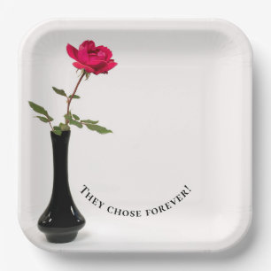 single red rose in black vase paper plate