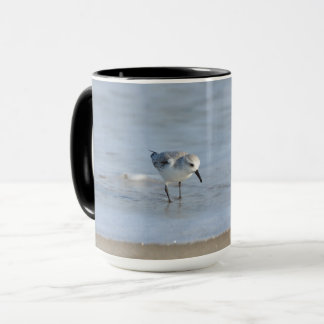 Single Sandpiper walking on beach Mug