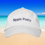 Sippin Pretty Embroidered / Preppy Wine Baseball  Hat<br><div class="desc">Stay effortlessly stylish with this “Sippin’ Pretty” embroidered baseball hat. Featuring classic navy blue stitching on a crisp white cap, this preppy and polished design is perfect for wine lovers who love a chic, understated look. Whether you're heading to brunch, a vineyard, a beach day, or a girls trip, this...</div>
