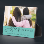 Sisters Handwritten Script Typography Photo Plaque<br><div class="desc">Celebrate the unbreakable bond of sisterhood with our Sisters Handwritten Script Typography Photo Plaque,  featuring elegant,  modern script on a jade blue background. This keepsake beautifully captures cherished memories,  making it the perfect gift for best friends and beloved sisters alike.</div>