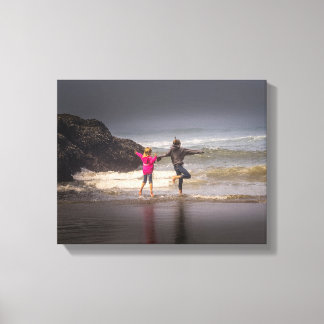 Sisters on a Foggy Morning at the Beach Canvas Print