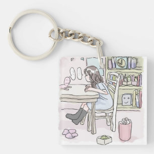 sit down at a desk in a small room key ring