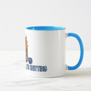 sitting knitting mug