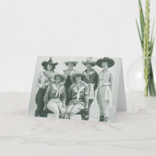 Six cowgirls in hats and sashes. card
