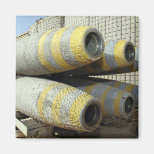 Six GBU-12 bombs sit in a rack Magnet