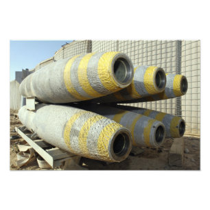 Six GBU-12 bombs sit in a rack Photo Print