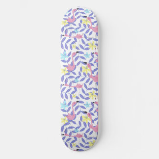 Skateboard with pink flamingo print and tropical s