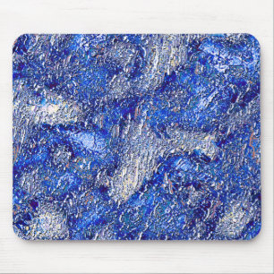 Skeened to very rough grey stains on blue texture mouse mat