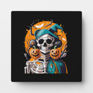 Skeleton and pumpkin plaque